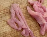 A picture of step 2 of Chicken breast stir fry with chilli, soysauce, black vinegar, Chinese style.