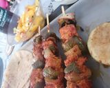 A picture of step 4 of Chicken Kebabs, with cocktail rotis and fresh Mango salsa.
