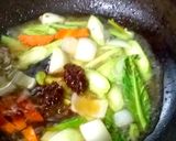 รูปขั้นตอนการทำที่ 4 ของ กุ้งผัดเม็ดมะม่วง