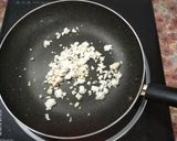 A picture of step 2 of Coconut And Paneer Puronpali.