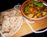 A picture of step 11 of Allu Karahi.