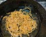 A picture of step 4 of Khau Suey.