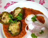 A picture of step 7 of Punjabi Paneer stuffed Capsicum in Red Gravy.