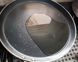 A picture of step 1 of Tawa kaleji.