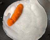 A picture of step 3 of Patishapta Pithe with Motichoor Laddu Stuffing - Bengali Fusion style dessert.
