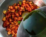A picture of step 4 of Mango pickle.
