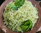 A picture of step 6 of Thai green rice with fried fish.