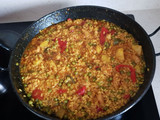 Arroz con pollo y patatas