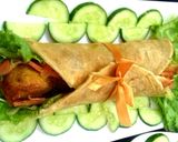 A picture of step 7 of Zinger Mayo Garlic Paratha Roll.