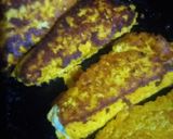A picture of step 3 of Tortilla wrap filled grilled cheesy white sauce.