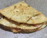 A picture of step 4 of Roti Pizza Wrap.