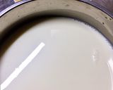 A picture of step 2 of Flan (Vietnamese Caramel Custard).