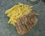 Foto del paso 2 de la receta: Bifes de Bondiola de Cerdo con fritas