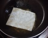 A picture of step 5 of Saganaki with Apricots and Graviera Cheese.