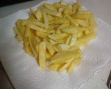 Foto del paso 3 de la receta: Patatas fritas con queso y pavo al horno
