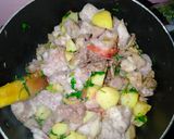 A picture of step 9 of Fried nduma with beef and potato served. with spinach.