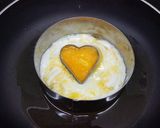 Foto del paso 6 de la receta Pimientos artesanos hechos a la leña con huevo en forma de corazón