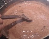 A picture of step 3 of Hershey 's cocoa almond shake.