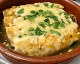 A picture of step 5 of Chicken Enchiladas with Green Sauce.