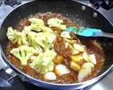 A picture of step 12 of Aloo Gobi Matar (Potato, Cauliflower, and Pea Curry).