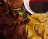 A picture of step 3 of Jacket potato with beef stir fry and gyoza chicken dumplings.