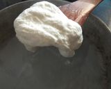 A picture of step 5 of Homemade Mozzarella Cheese.