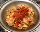 A picture of step 2 of Jae Yook Bokk GeumStir Fry Kimchi and Pork Belly.