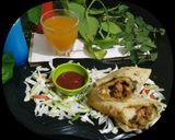 A picture of step 13 of Chatpata Chana Wrap.