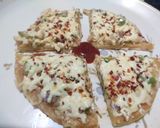 A picture of step 12 of Veg Cheese Paneer Pan Pizza.