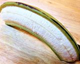 A picture of step 1 of Tostones (Patacones) with Green Garlic Sauce.