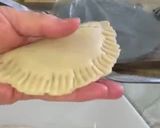 A picture of step 4 of Empanadas with Cola.