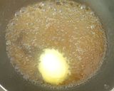 A picture of step 3 of Baked caramel popcorns.