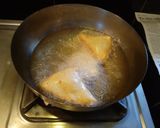 A picture of step 3 of Mandazi with cardamom powder.