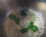 A picture of step 3 of Cardamom and tulsi tea.