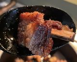 A picture of step 1 of Pork Ribs in Red Sauce with Chile de Árbol.
