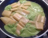Foto del passaggio 9 della ricetta Paccheri con crema di zucchine, calamari e melanzane fritte