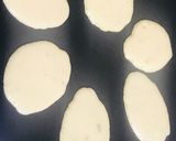 A picture of step 4 of Dollar pancakes with dash of honey.