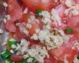 A picture of step 2 of Rote with spicy aloo gravy.