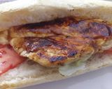 A picture of step 2 of BBQ chicken panino with buttered Corn on the cob.