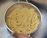 A picture of step 1 of Spaghetti & Sausage.