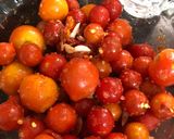 A picture of step 2 of Cherry tomato pickle.