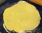 Une image de l'étape 10 de Tourte au munster, oignon, cumin et vin blanc.