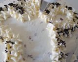 A picture of step 10 of Chocolate cake with chef's hat.