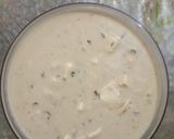 A picture of step 7 of Nawabi paneer korma with white gravy.
