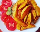 A picture of step 6 of Rosemary baked potato wedges.
