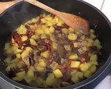 Une image de l'étape 7 de Poêlée de riz et pommes de terre aux tomates séchées et épices indiennes.