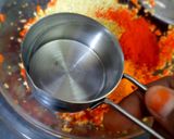 A picture of step 7 of Red chilli pickle.