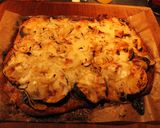 Foto del paso 29 de la receta: Pizza de berenjenas, cebolla, tomatitos y mozzarella