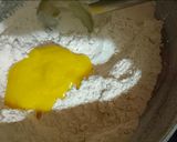A picture of step 3 of Panjiri Laddu recipe from flour and gram flour.