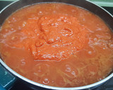 Foto del paso 6 de la receta: Pimientos rellenos de bacalao con salsa de tomate y pimientos